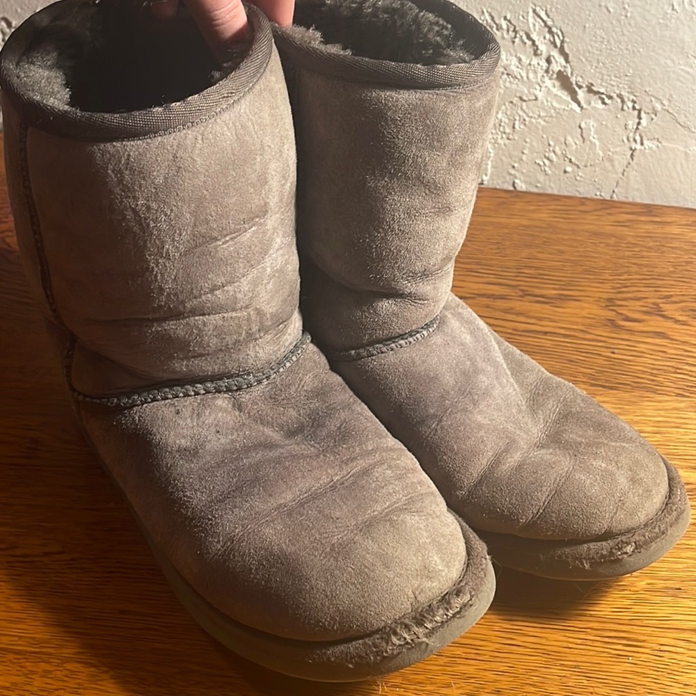 THE gray mini ugg boot. Little signs of wear. Size 7.